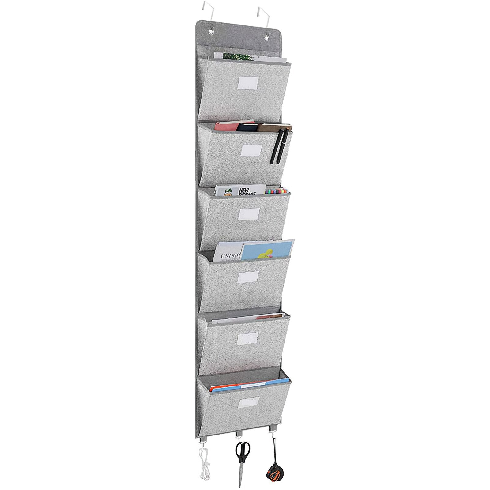 A grey wall-mounted hanging file folder storage pocket, designed to hold magazines and documents, showcasing its durable non-woven material and space-saving design.