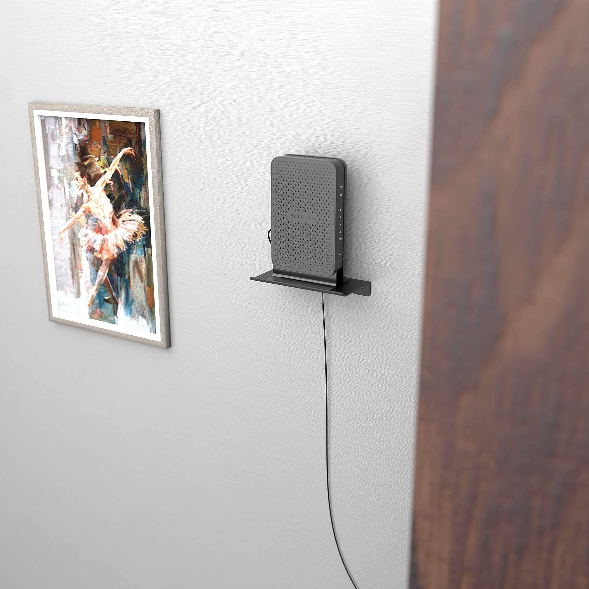 Small Router or Speaker Shelf mounted on a wall, showcasing a router and speaker neatly organized with concealed wiring.