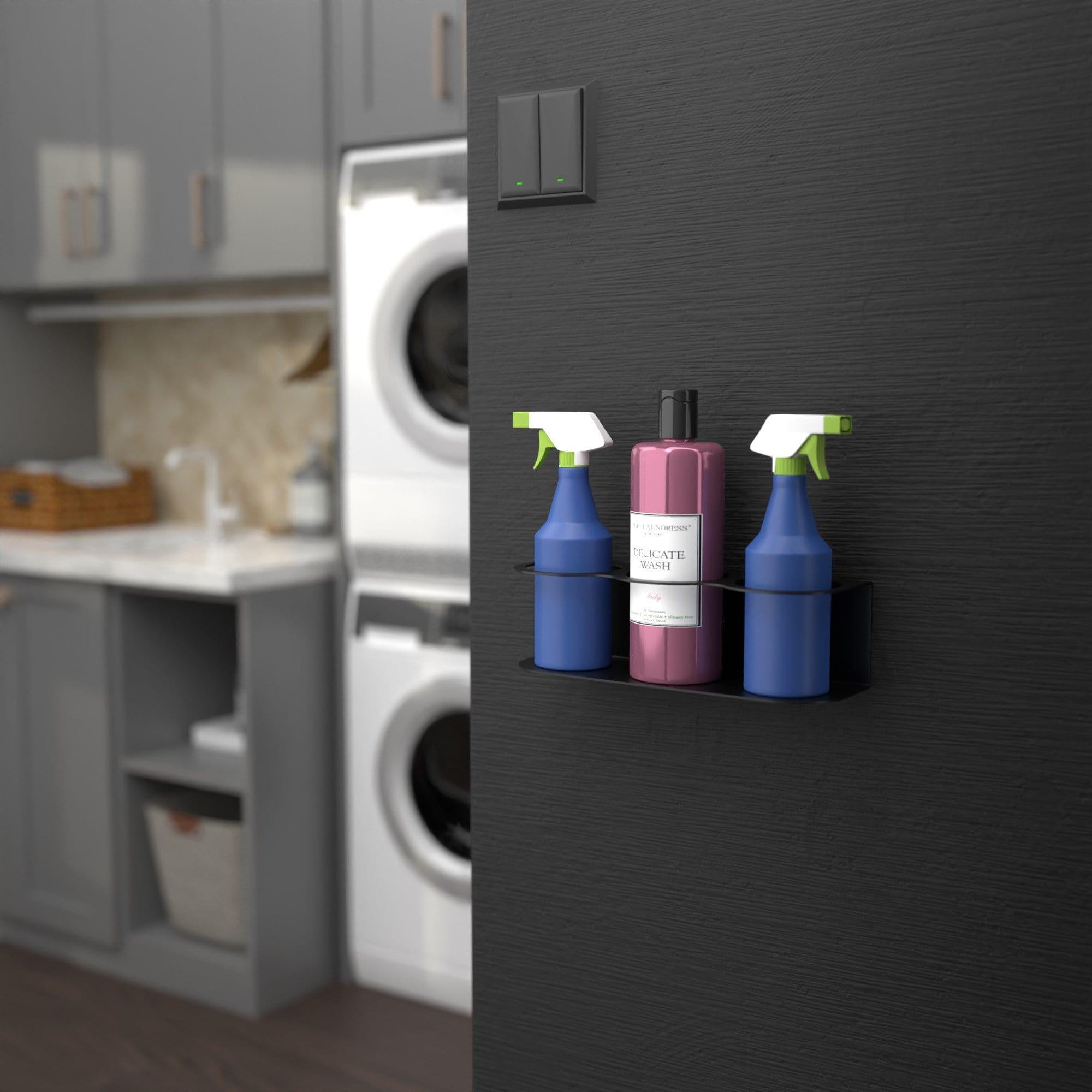 Wall-mounted spray bottle holder designed to hold three bottles, made of heavy-duty steel with a sleek black finish.