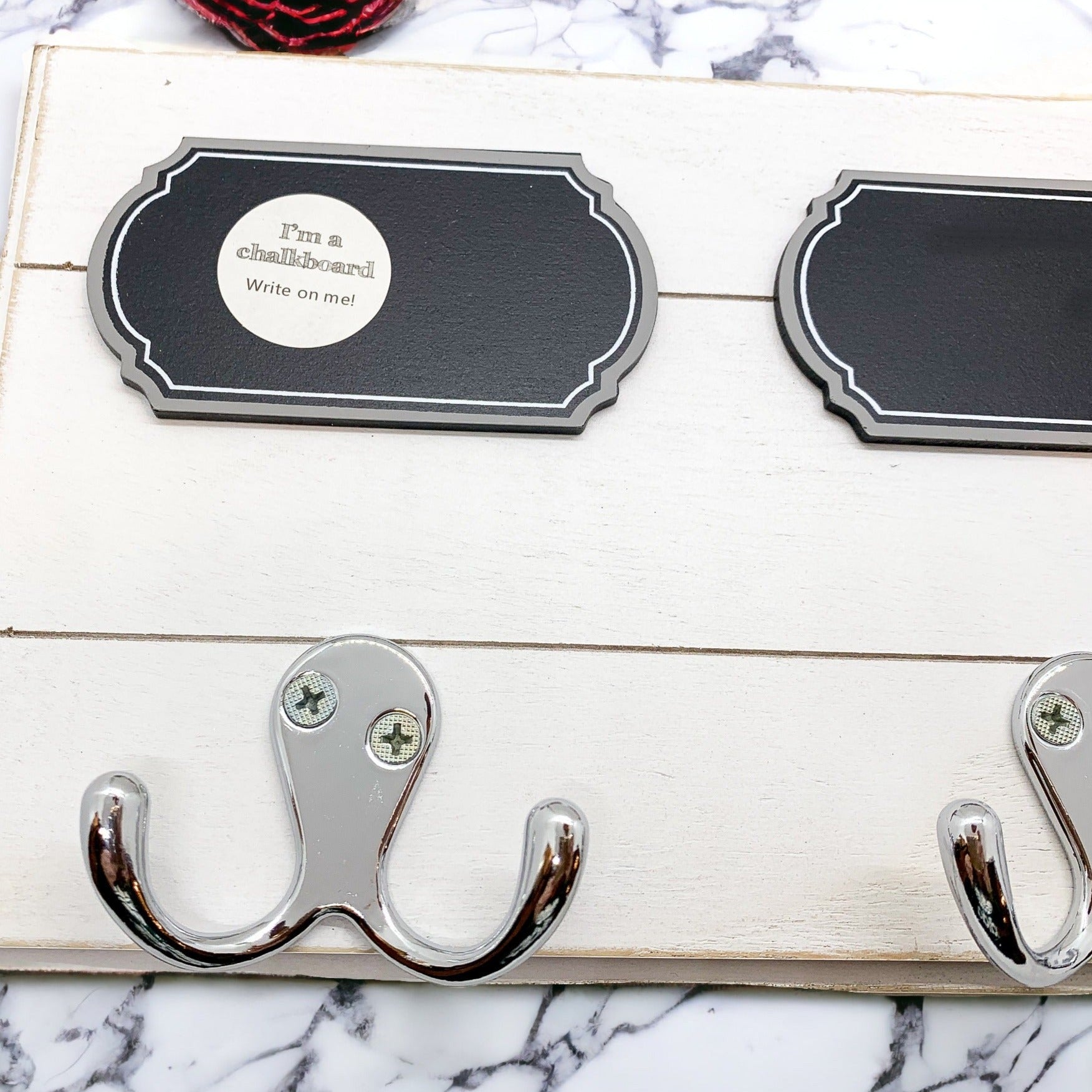 Triple Hang Chalk coat hanger with three hooks and chalkboard labels for reminders, made of high-quality wood.