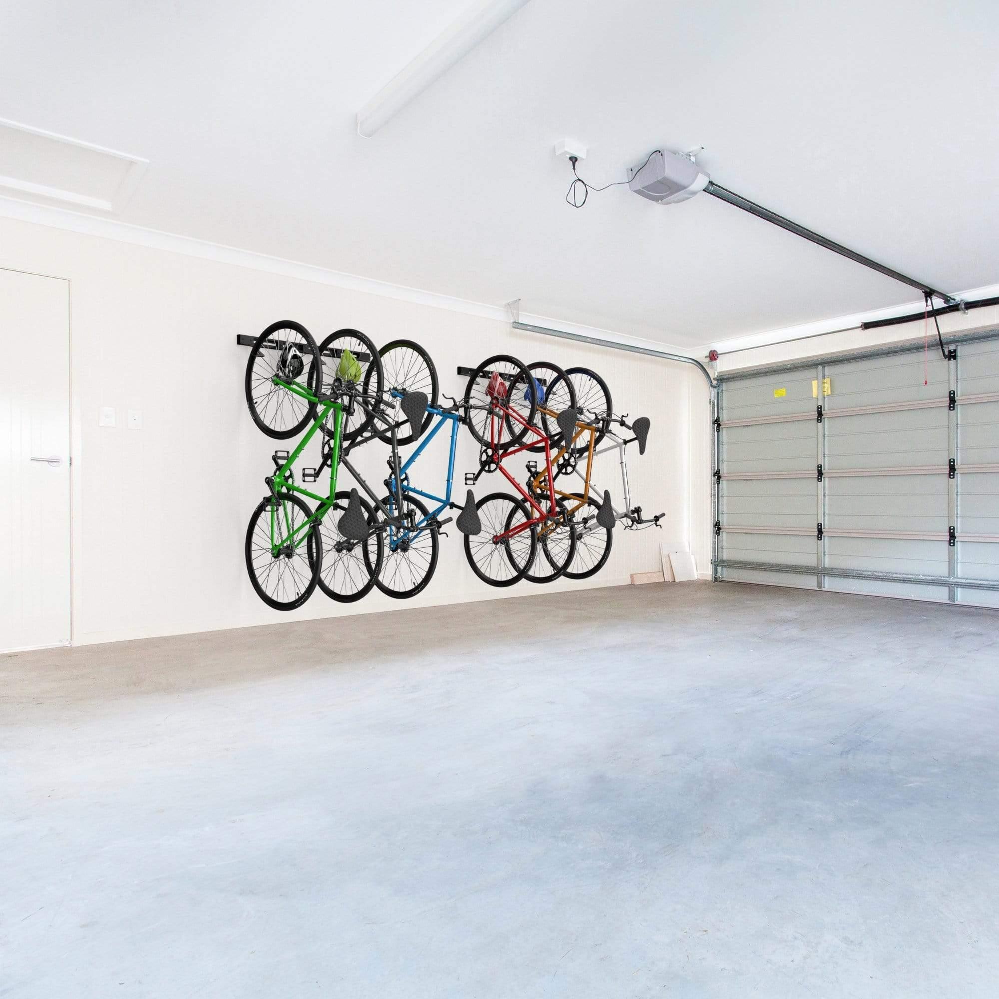 Koova Wall Mounted Bike Rack holding 6 bicycles, showcasing its sturdy design and versatility for various bike types.