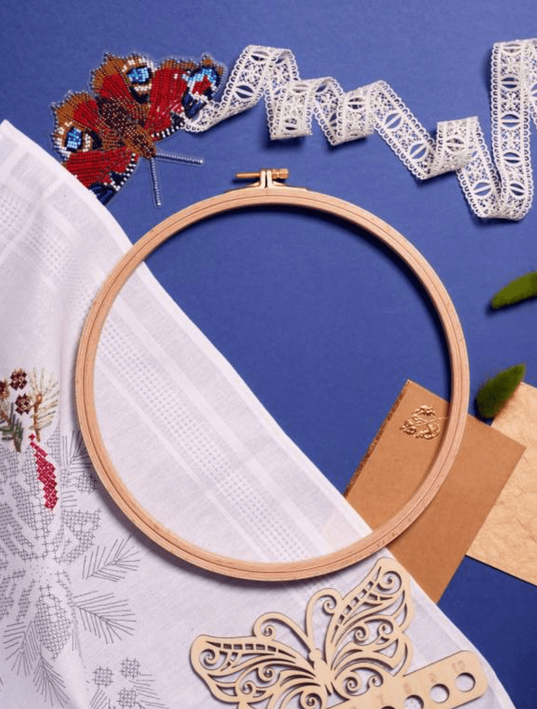 Nurge 16mm Screwed Wooden Embroidery Hoop made of beech wood with brass fittings, showcasing a smooth finish and elegant design.