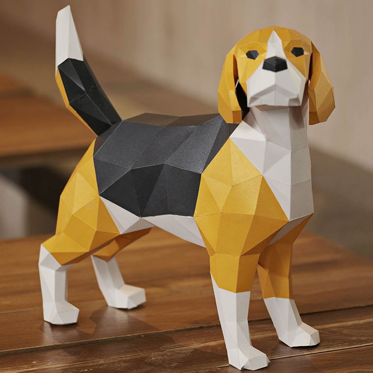 A beautifully crafted 3D Beagle Dog Model made from pre-cut paper, showcasing its detailed features and vibrant colors.