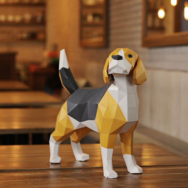 A beautifully crafted 3D Beagle Dog Model made from pre-cut paper, showcasing its detailed features and vibrant colors.