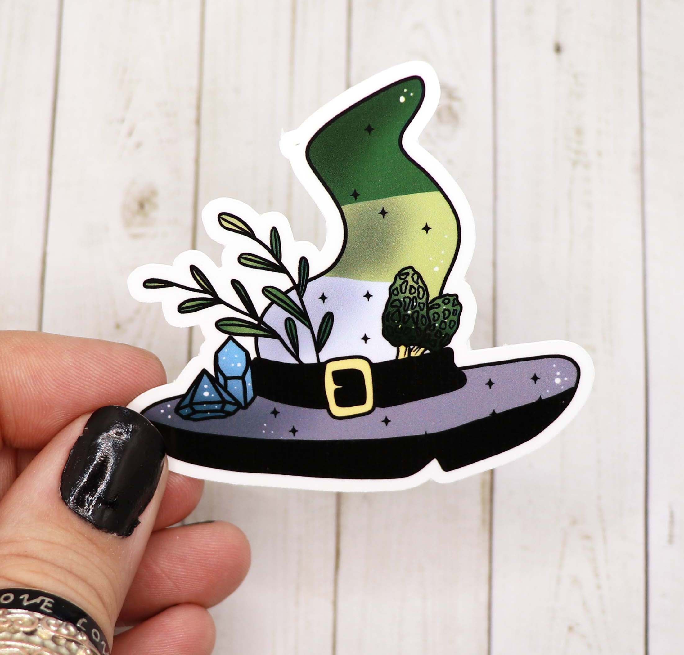 Agender Pride Witch Hat Sticker featuring a colorful witch hat design on a matte vinyl background.