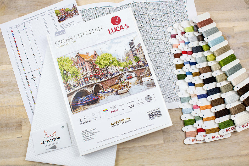 Amsterdam BU5005L Counted Cross-Stitch Kit with Aida canvas, needle, and 59 colors.