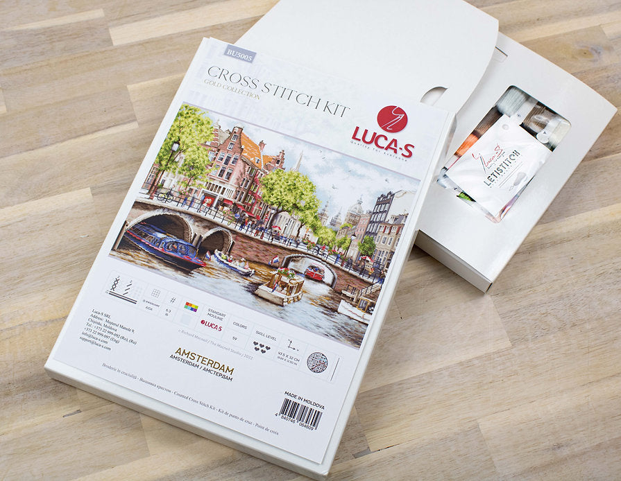 Amsterdam BU5005L Counted Cross-Stitch Kit with Aida canvas, needle, and 59 colors.