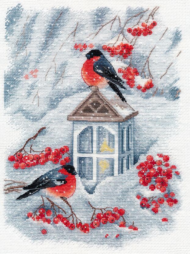 Counted cross stitch kit featuring a snowy Christmas scene with a lamp and bullfinches, perfect for holiday crafting.