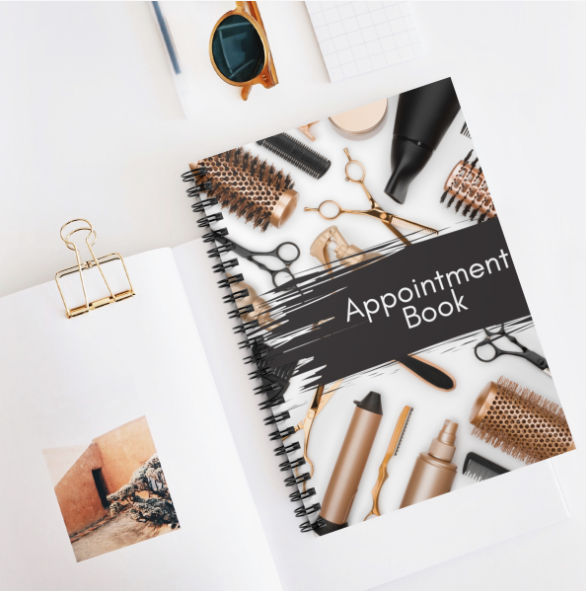 A spiral-bound A5 appointment book for hair professionals, featuring 100 undated pages for scheduling appointments.