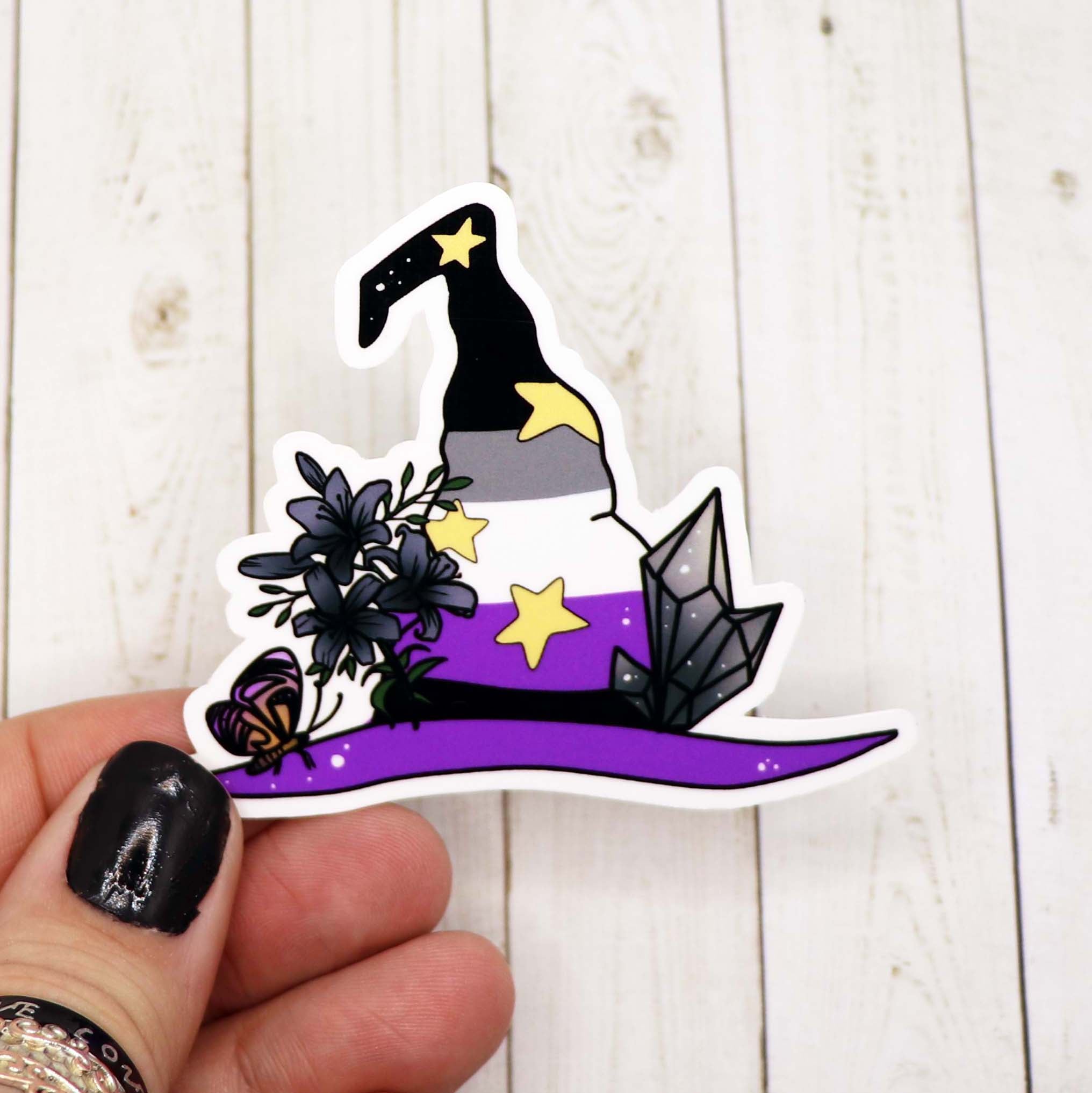 A colorful Asexual Pride Witch Hat Sticker on a white background, featuring a witch hat design with asexual pride colors.