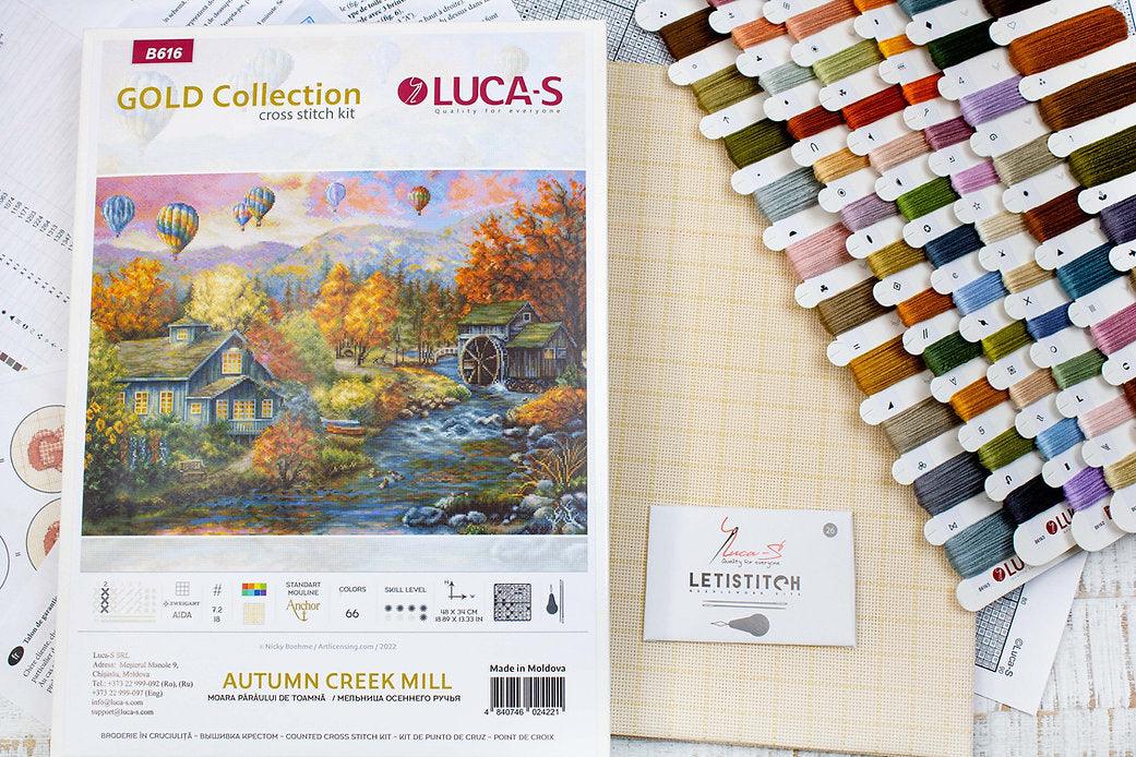 Autumn Creek Mill B616L Counted Cross-Stitch Kit with Aida canvas, colorful threads, and needle, showcasing the complete crafting set.