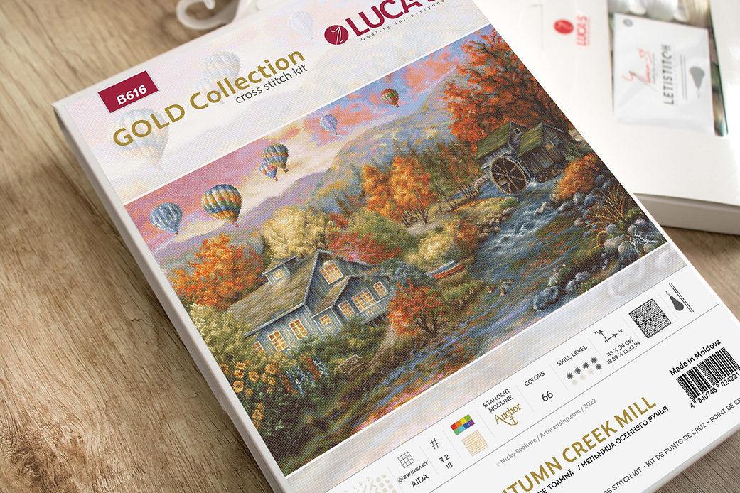 Autumn Creek Mill B616L Counted Cross-Stitch Kit with Aida canvas, colorful threads, and needle, showcasing the complete crafting set.