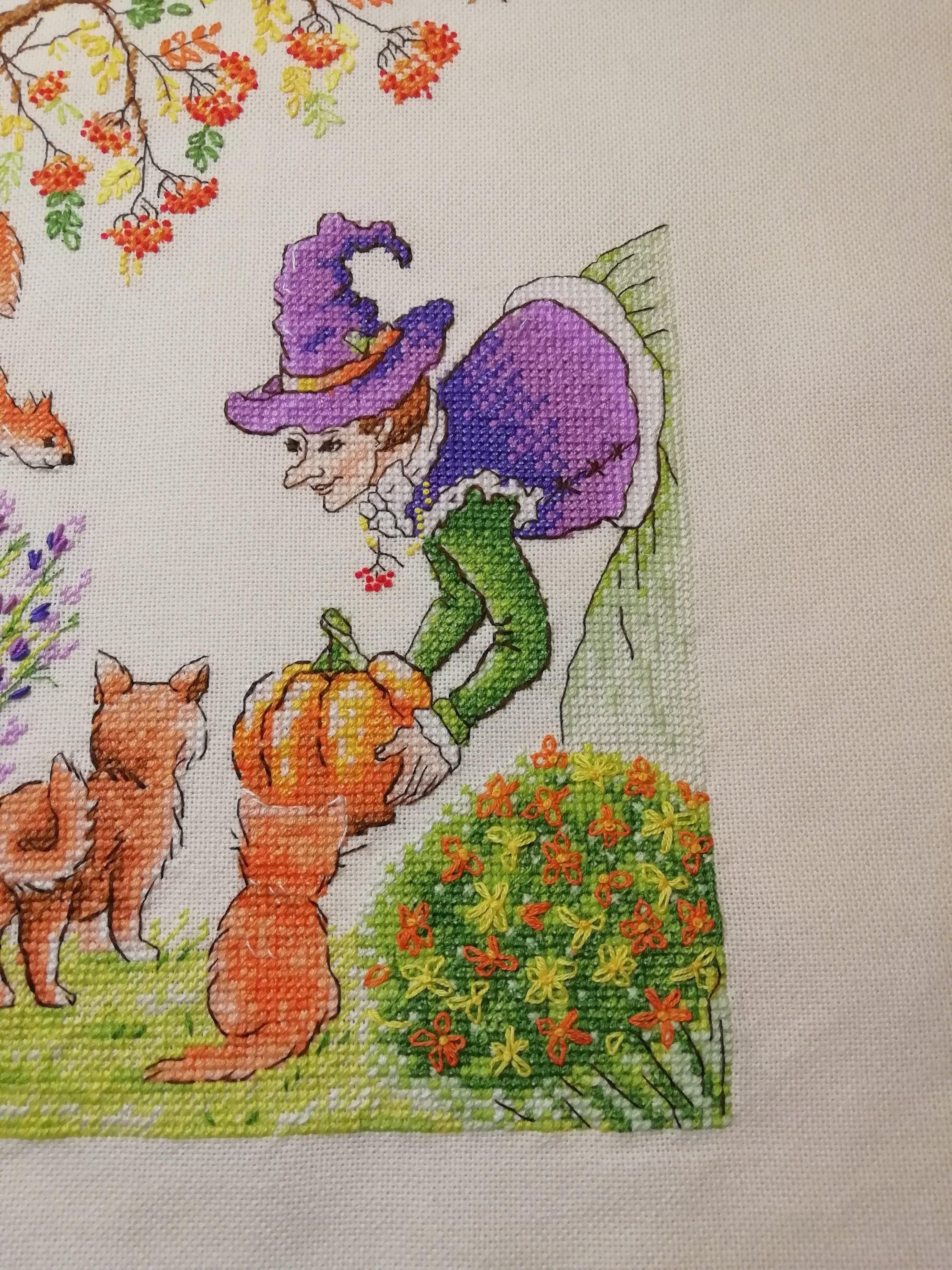 Autumn Gifts SP-05 Counted Cross-Stitch Kit featuring a witch with a purple hat, pumpkin, and forest animals, showcasing vibrant threads and quality materials.