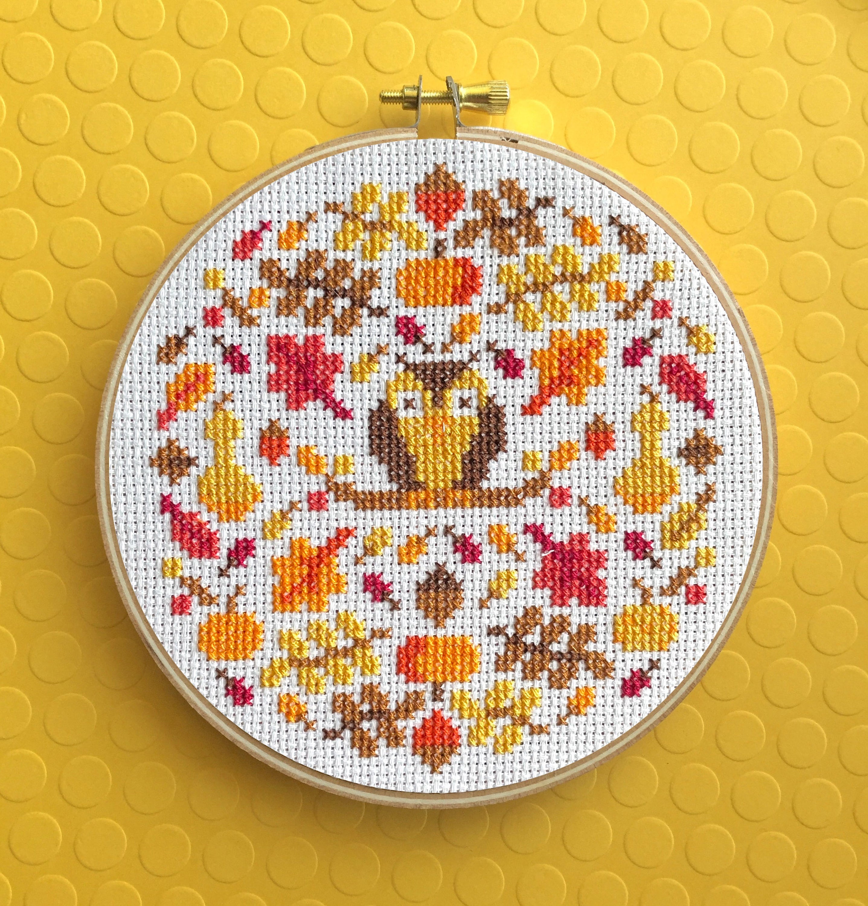 Autumn Mood Cross Stitch Kit featuring an owl design with included materials like threads, fabric, and hoop.