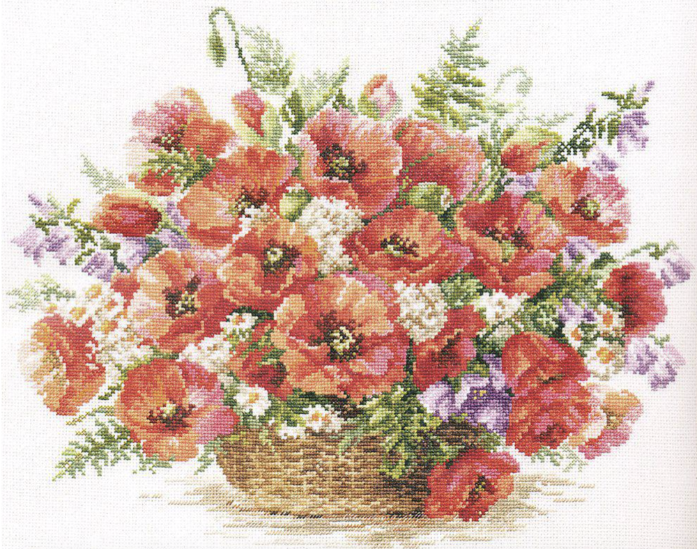 A beautifully arranged cross-stitch kit featuring a basket of poppies, including threads, needle, and white Aida fabric.