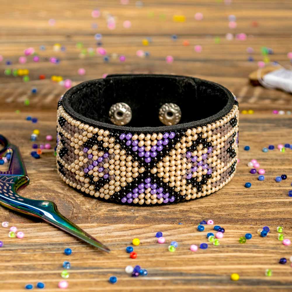 Bead embroidery kit on artificial leather FLBB-011 with colorful beads and embroidery materials for crafting unique bracelets.