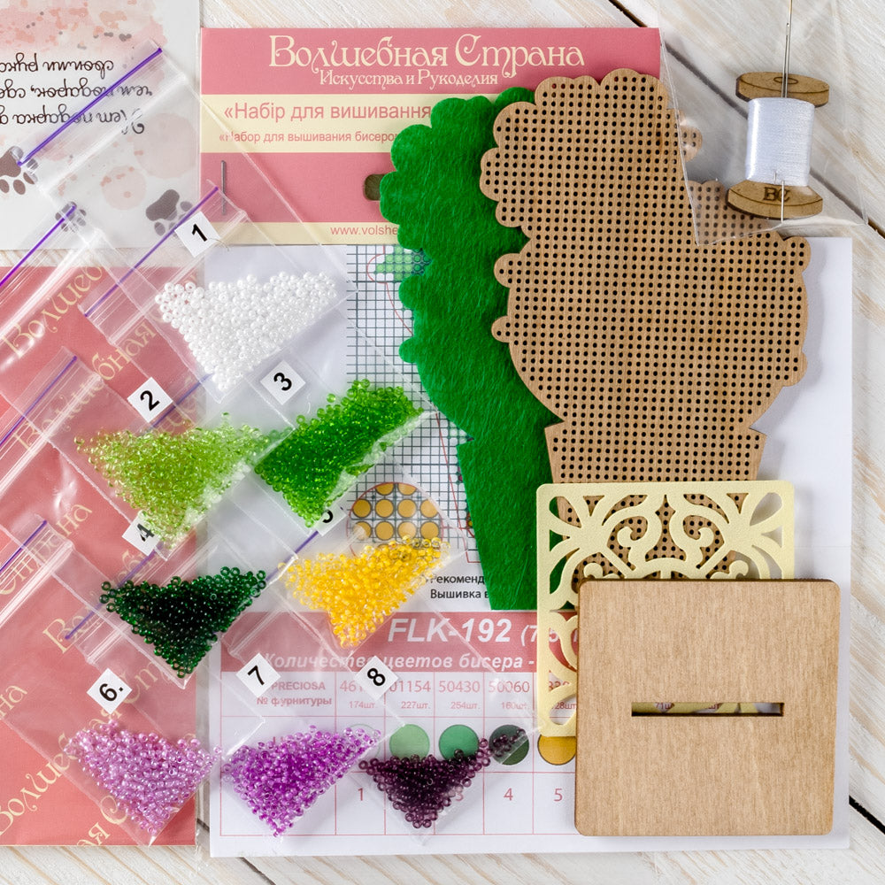 Bead embroidery kit on wood FLK-192 featuring a plywood blank, beads, and embroidery tools.