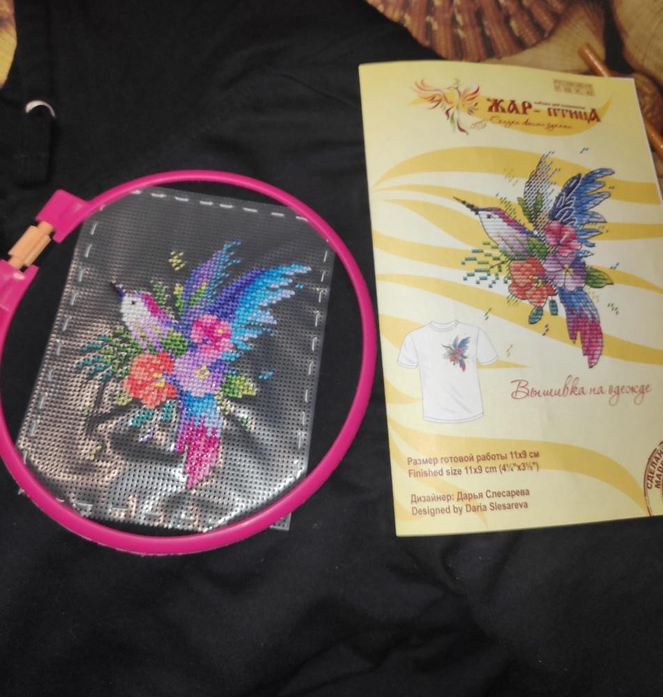 Bird of Paradise Cross Stitch Kit featuring water soluble canvas, colorful threads, and stitching supplies for unique clothing designs.