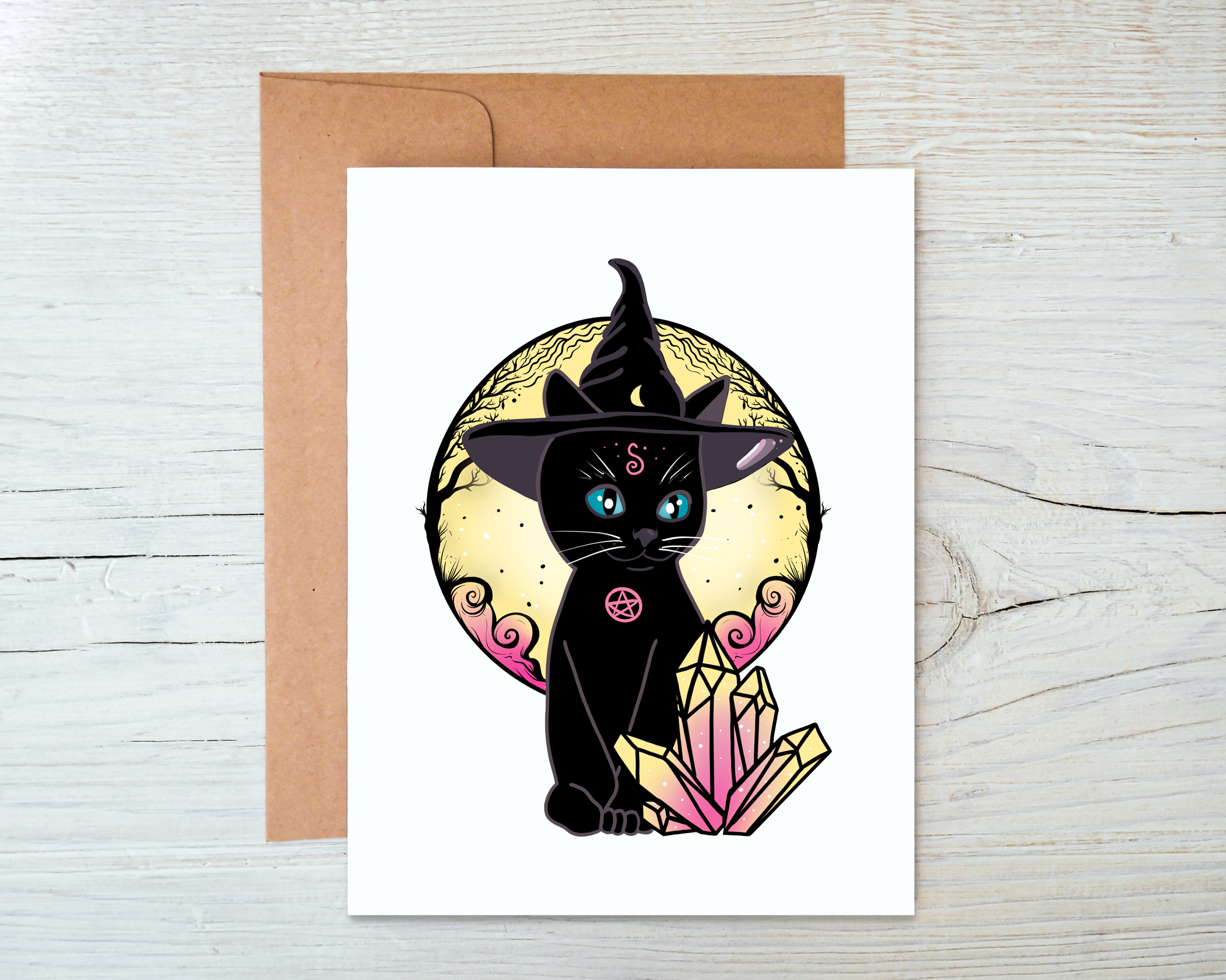 A whimsical black cat witch card with a blank interior, accompanied by a kraft envelope, perfect for personal messages.