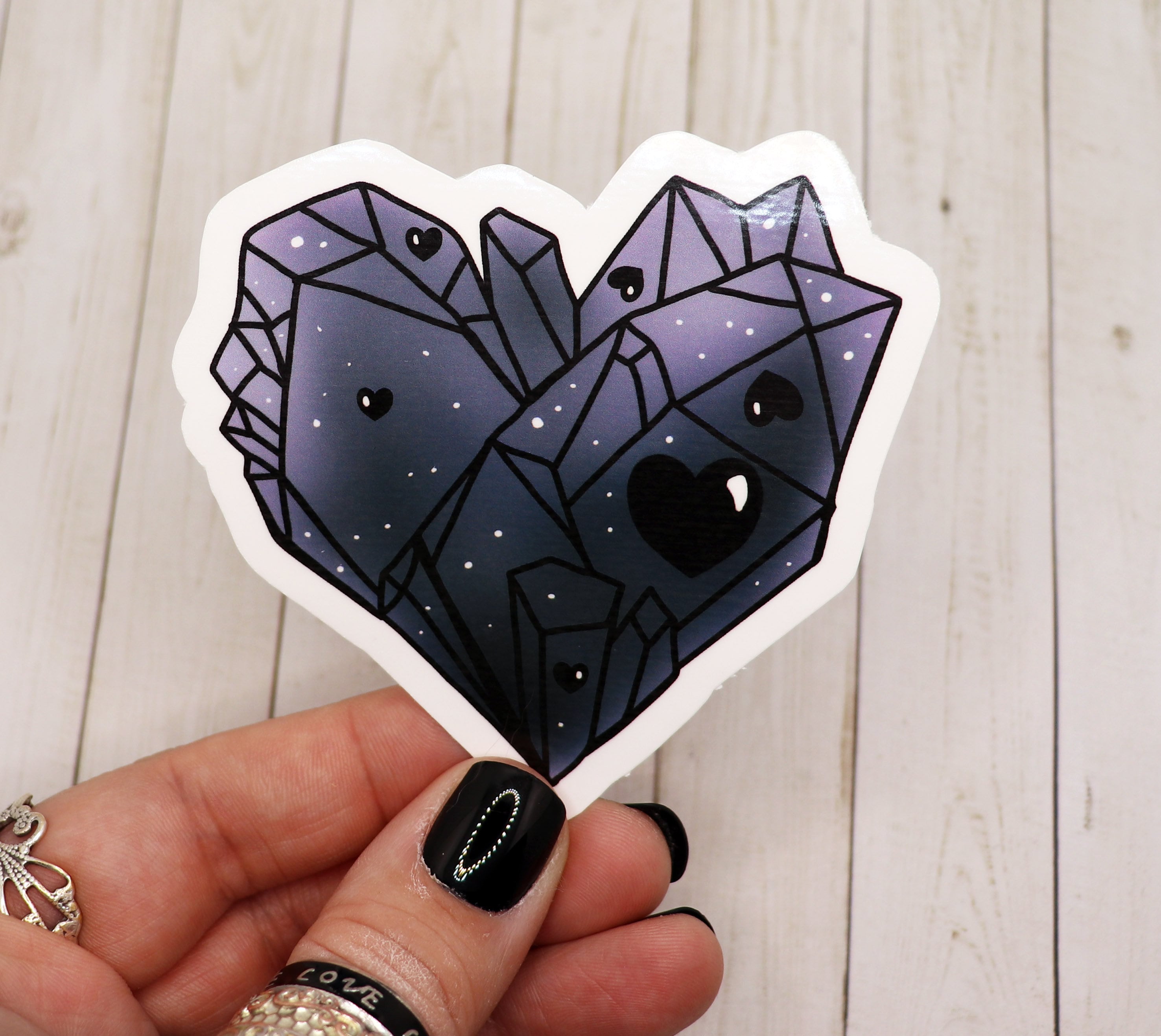 A stylish Black Crystal Heart Sticker on a white background, showcasing its elegant design and matte finish.