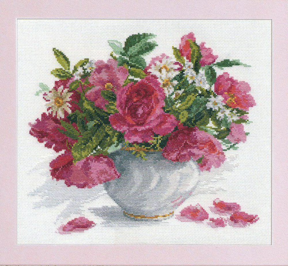 Blooming Garden Roses and Daisies Cross-Stitch Kit featuring colorful threads and white Aida fabric, perfect for crafting enthusiasts.