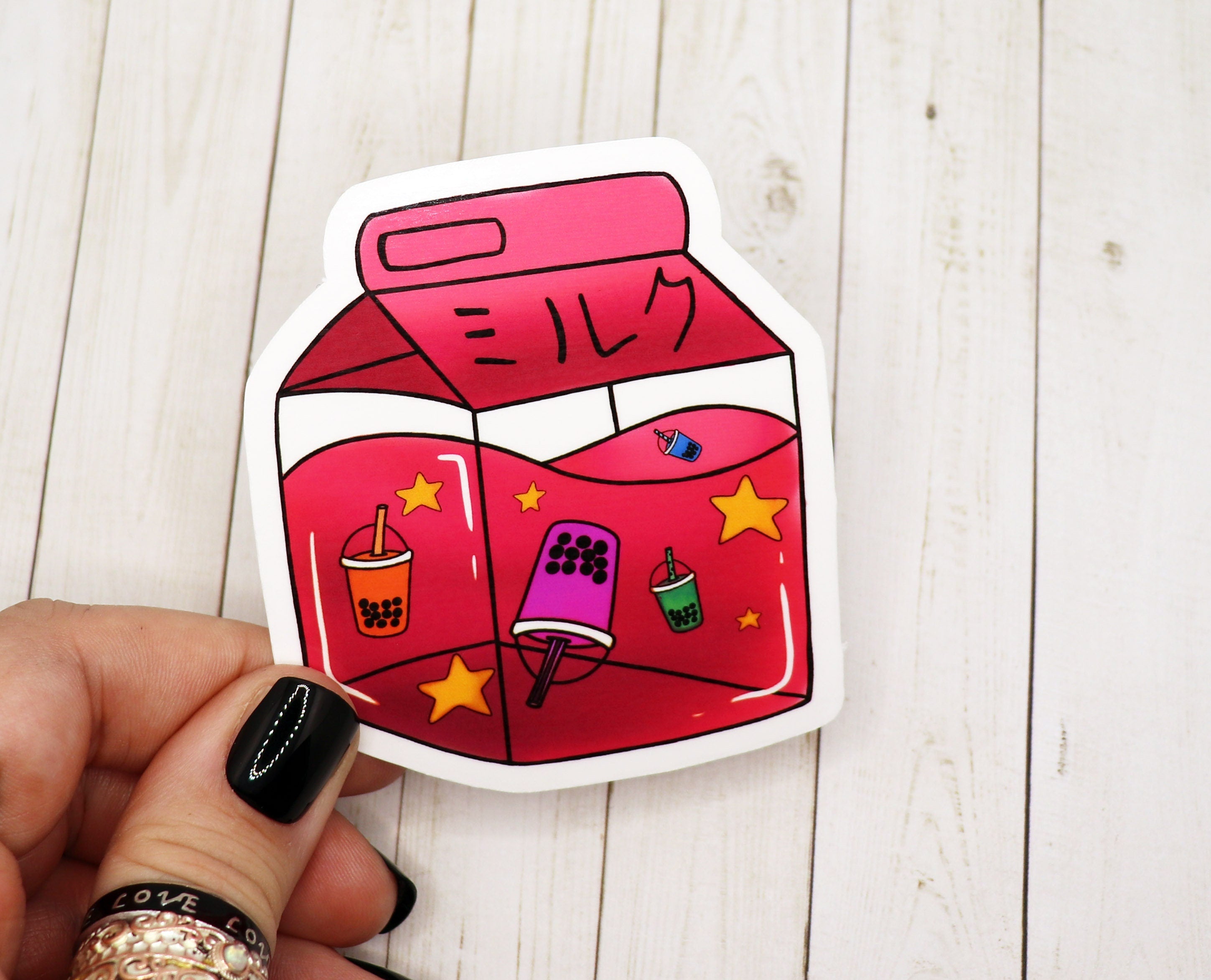 A colorful Boba Tea Milk Carton Sticker featuring a cute boba tea design, perfect for personalizing various items.