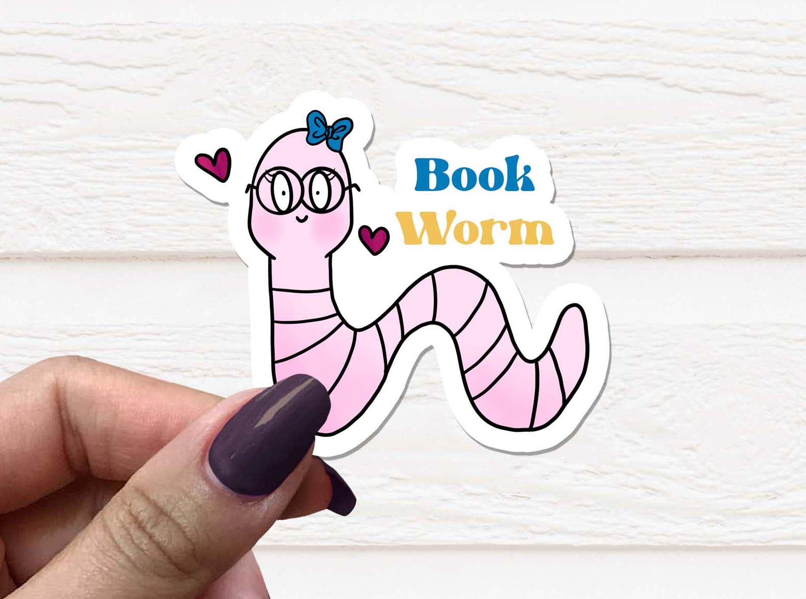 A colorful Book Worm Vinyl Sticker featuring a whimsical design, perfect for book lovers, displayed on a white background.