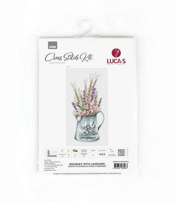 A counted cross-stitch kit featuring a bouquet of lavender and roses in a watering can, showcasing vibrant colors and intricate design.