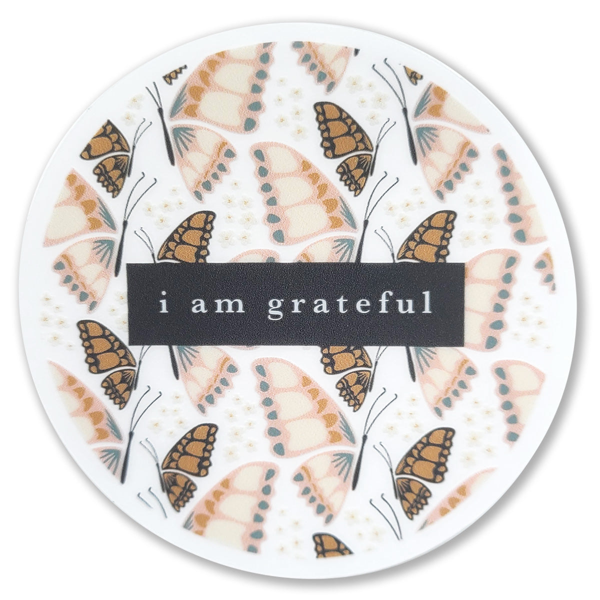 A 3-inch clear vinyl sticker featuring a butterfly design, symbolizing gratitude and positivity.