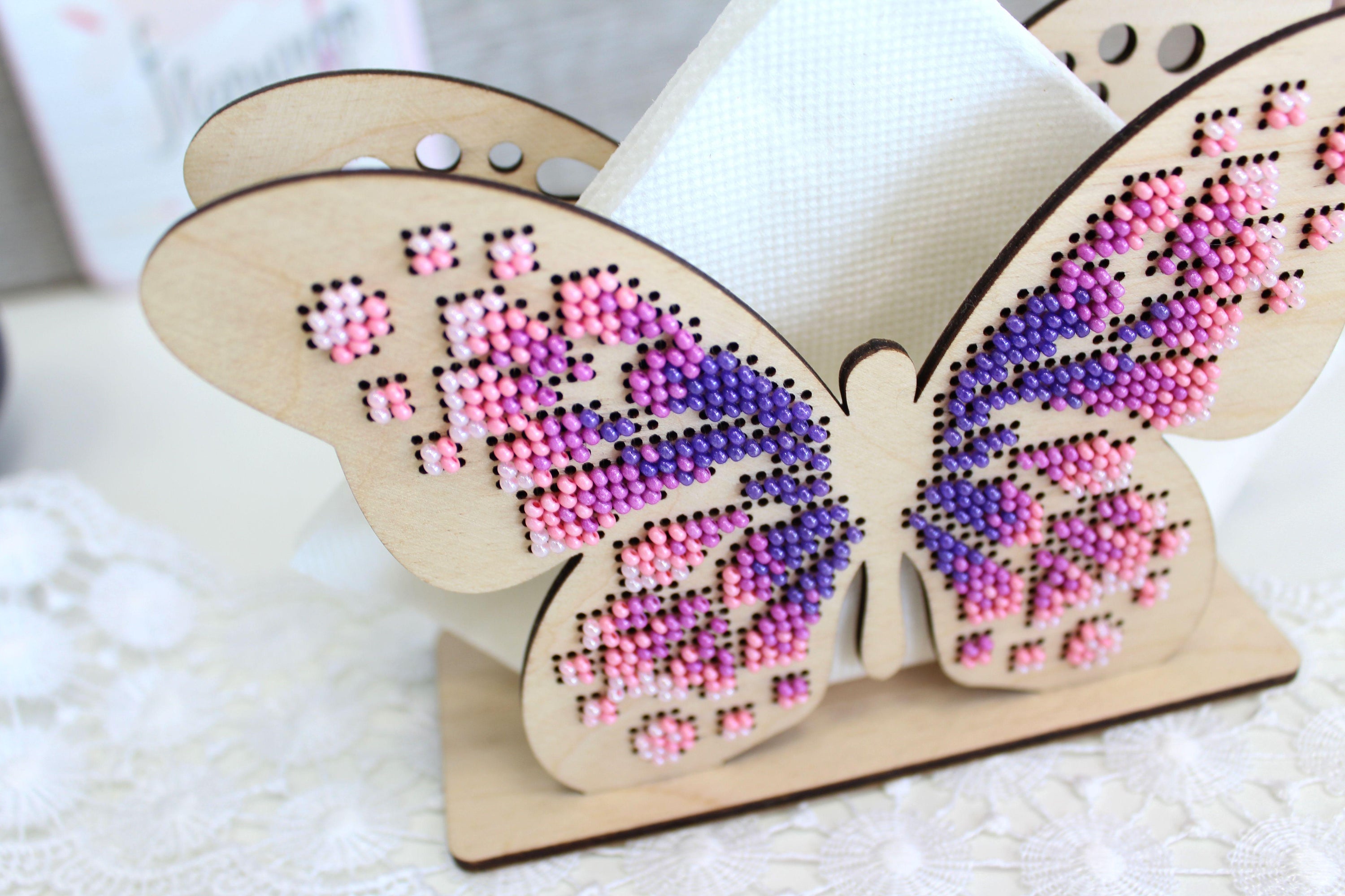 Butterfly Napkin Holder O-043 featuring intricate cross-stitch design on plywood with colorful beads.