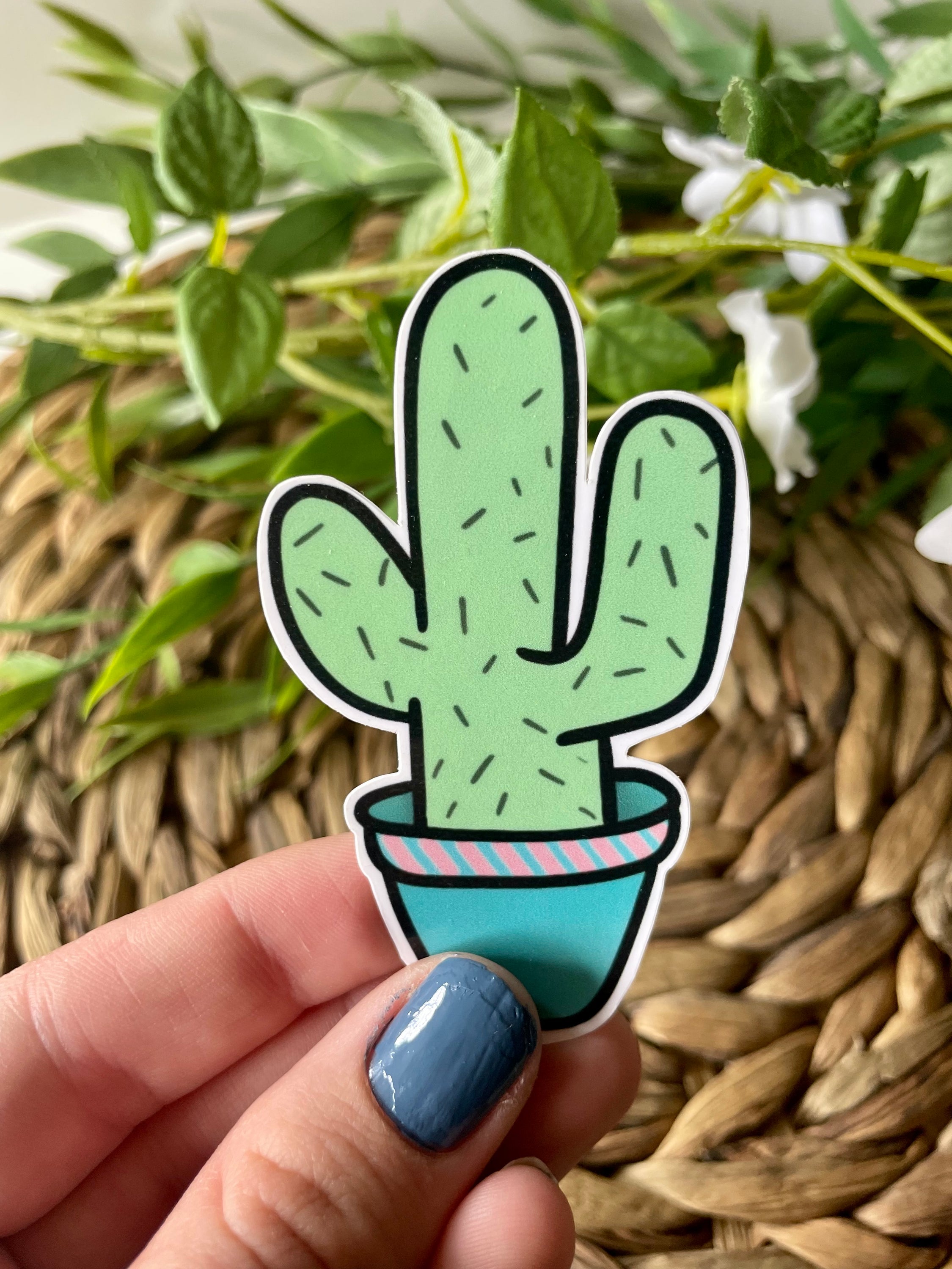 A cute cactus sticker featuring a vibrant green cactus design, perfect for personalizing items like laptops and water bottles.