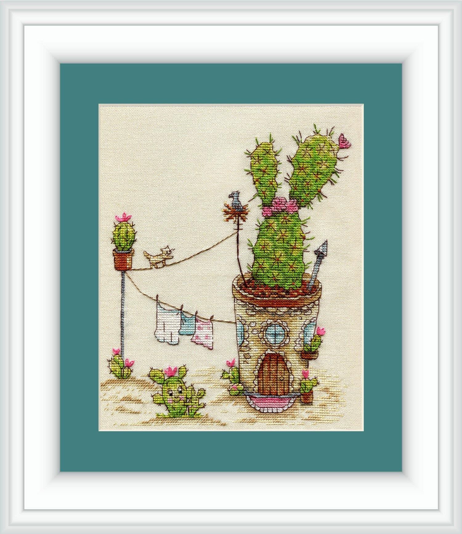 Cactuses CT-11 Counted Cross-Stitch Kit featuring a cartoon cactus house and family, with included materials like fabric, threads, and needle.