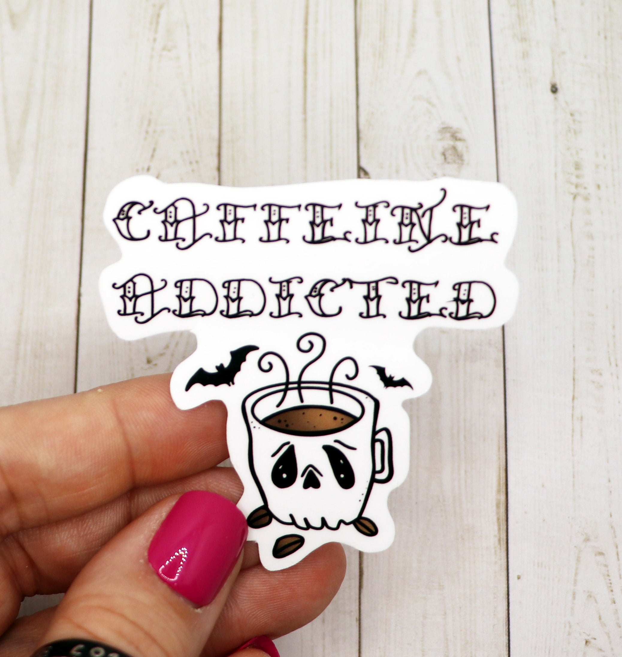 Caffeine Addicted Sticker on a matte vinyl surface, showcasing vibrant colors and a stylish design.