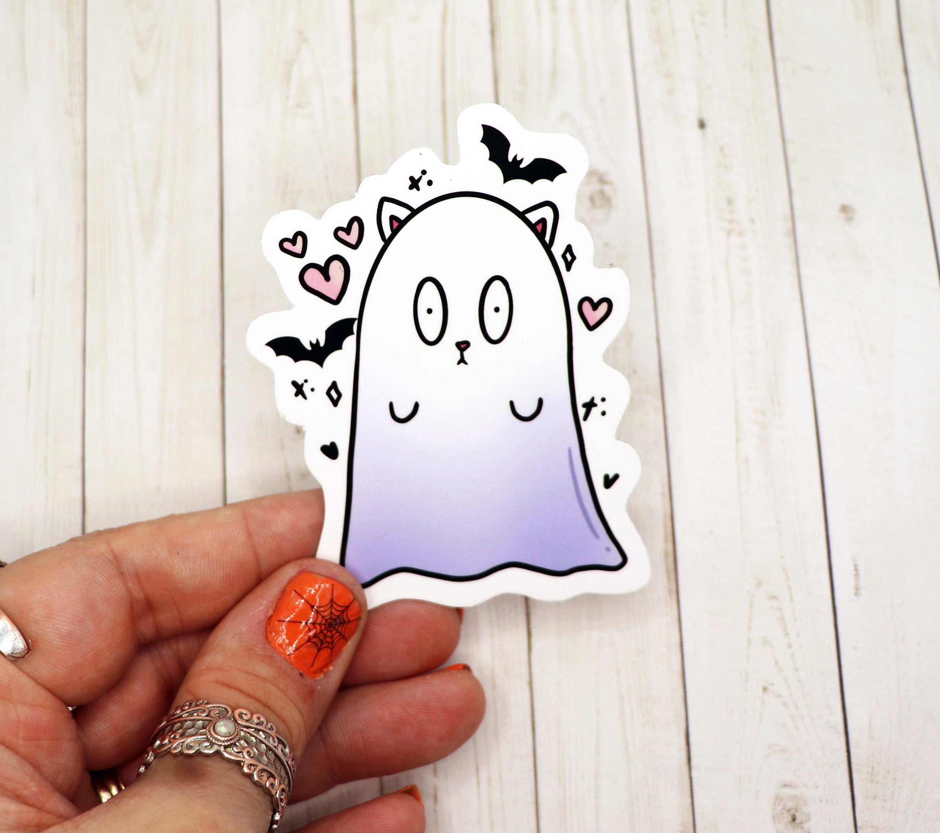 A 3.5-inch Cast Ghost Vinyl Sticker featuring a whimsical ghost design, perfect for personalizing various items.