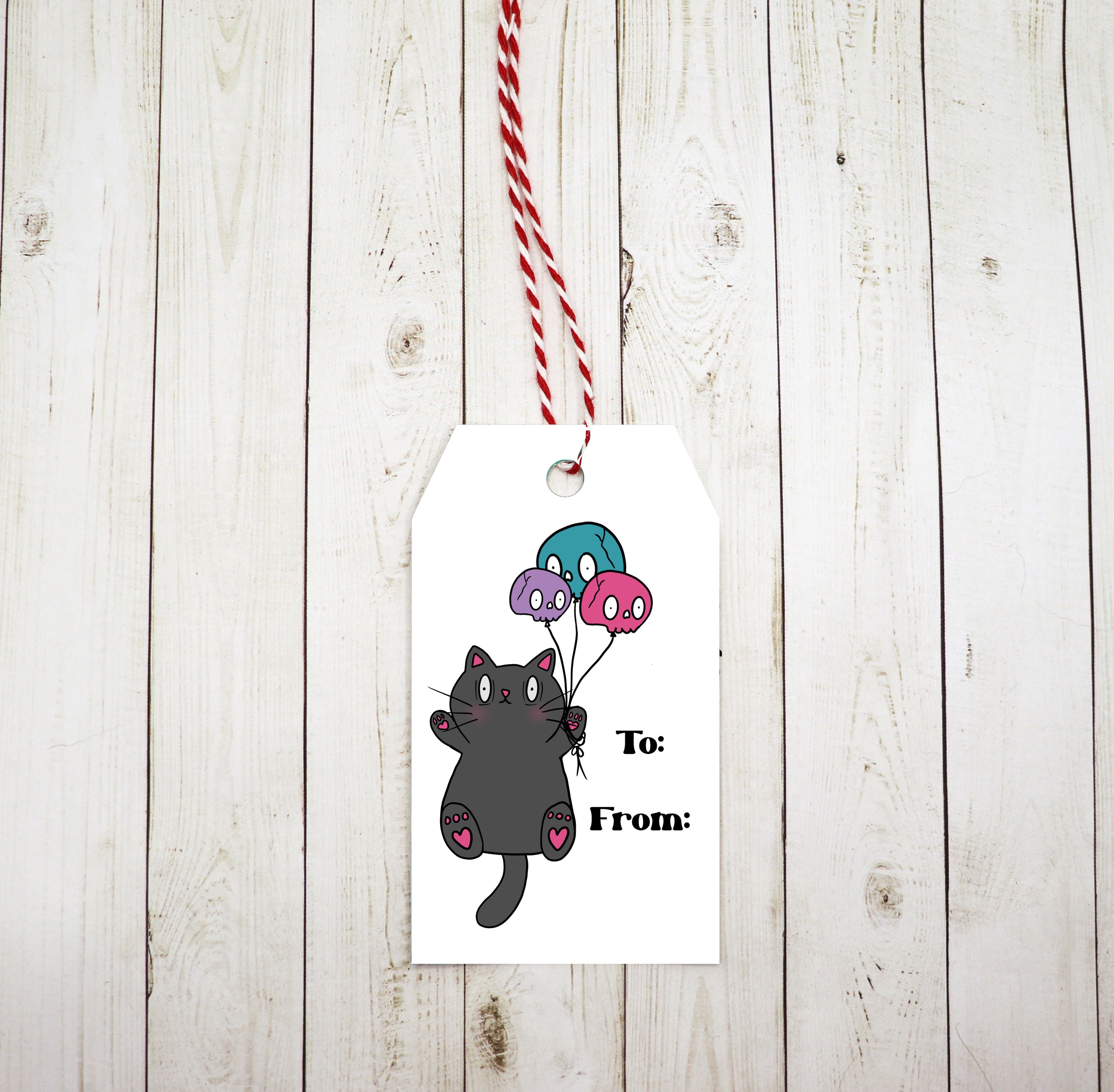 A set of eight adorable cat gift tags with red and white twine, printed on heavy white cardstock, perfect for any occasion.