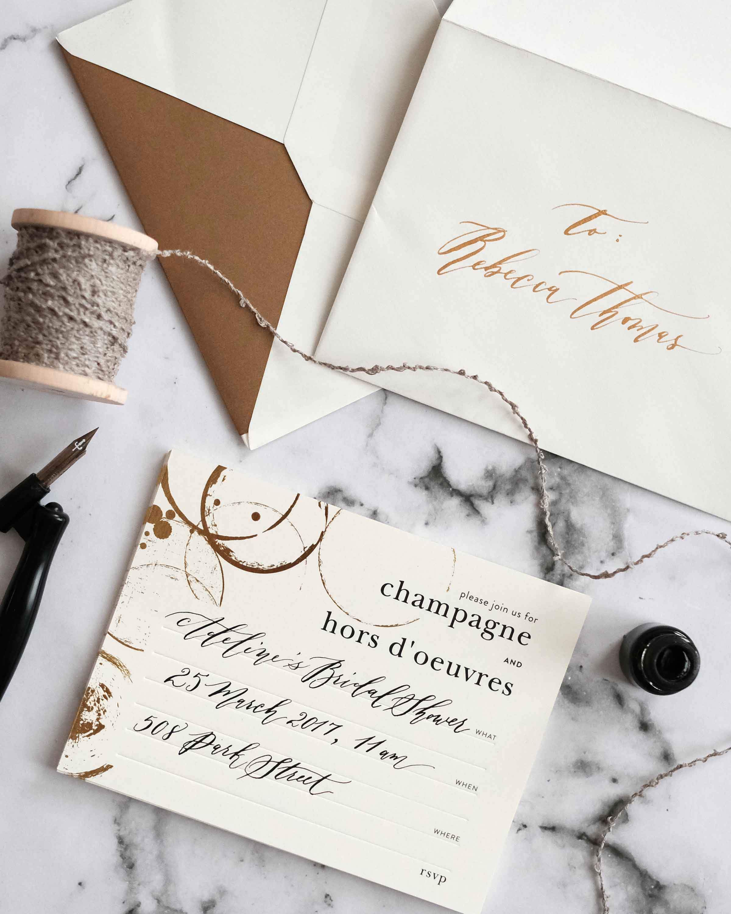 A stylish box set of Champagne & Hors D'oeuvres Invitations featuring elegant black deboss finish and lined envelopes.