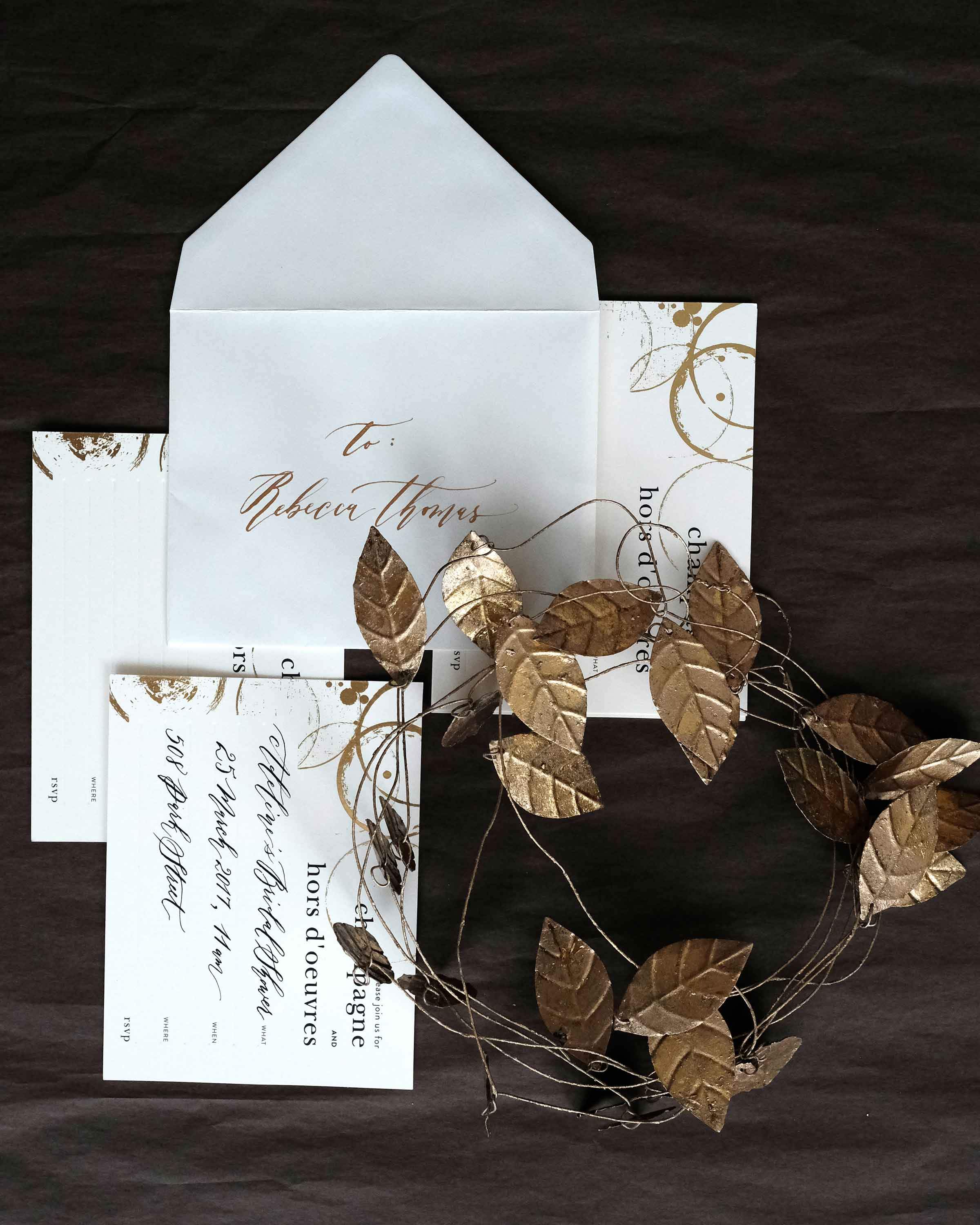 A stylish box set of Champagne & Hors D'oeuvres Invitations featuring elegant black deboss finish and lined envelopes.