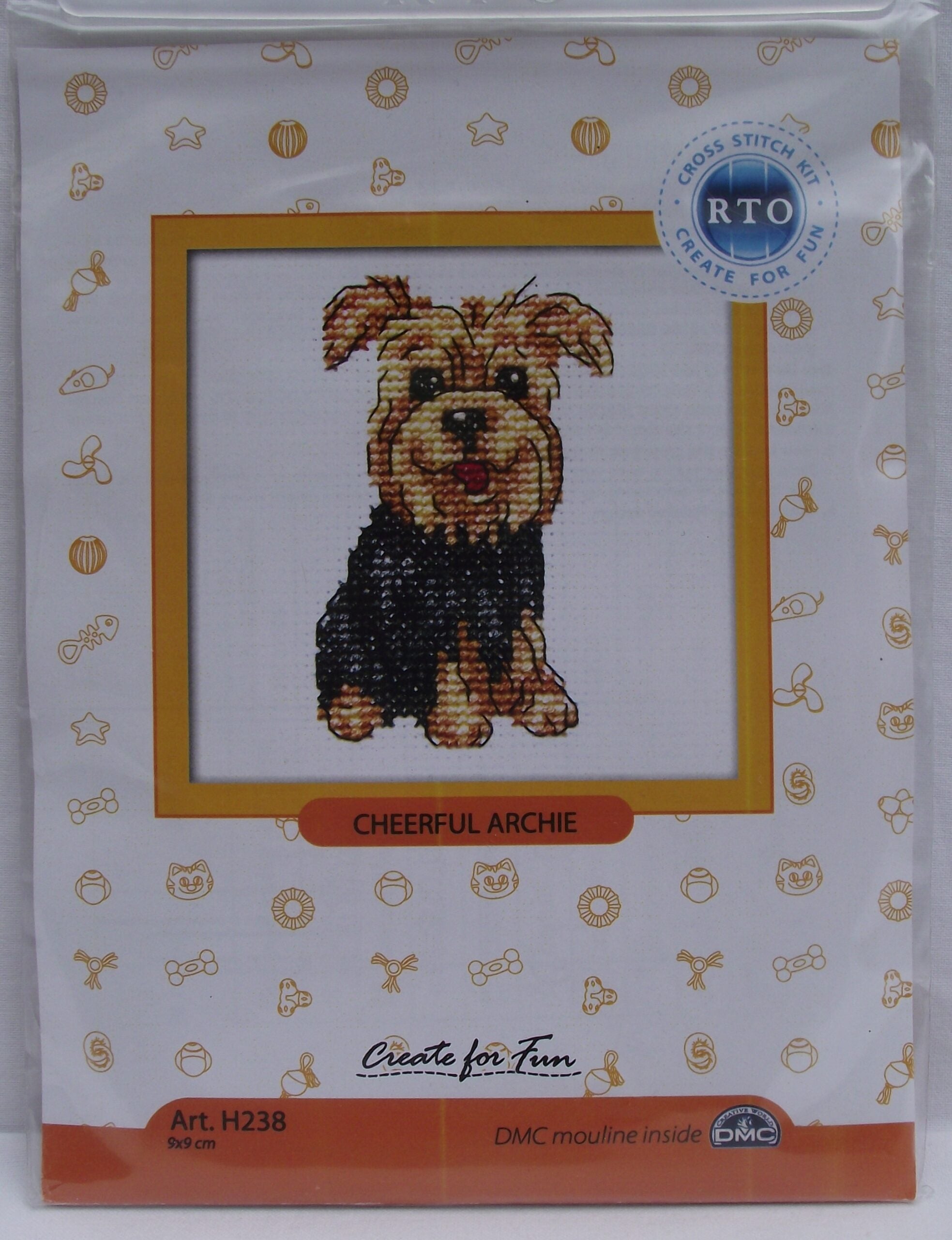 Cheerful Archie H238 Counted Cross Stitch Kit featuring Aida canvas, DMC threads, and needle, perfect for crafting.