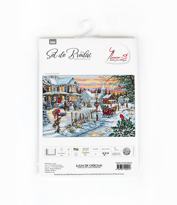 Christmas Eve B595L Counted Cross-Stitch Kit featuring Aida canvas, colorful threads, and needle for festive crafting.