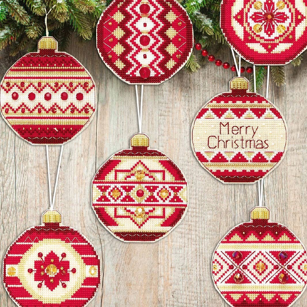 Colorful Christmas tree toy cross-stitch kit with beads and floss, perfect for holiday crafting.