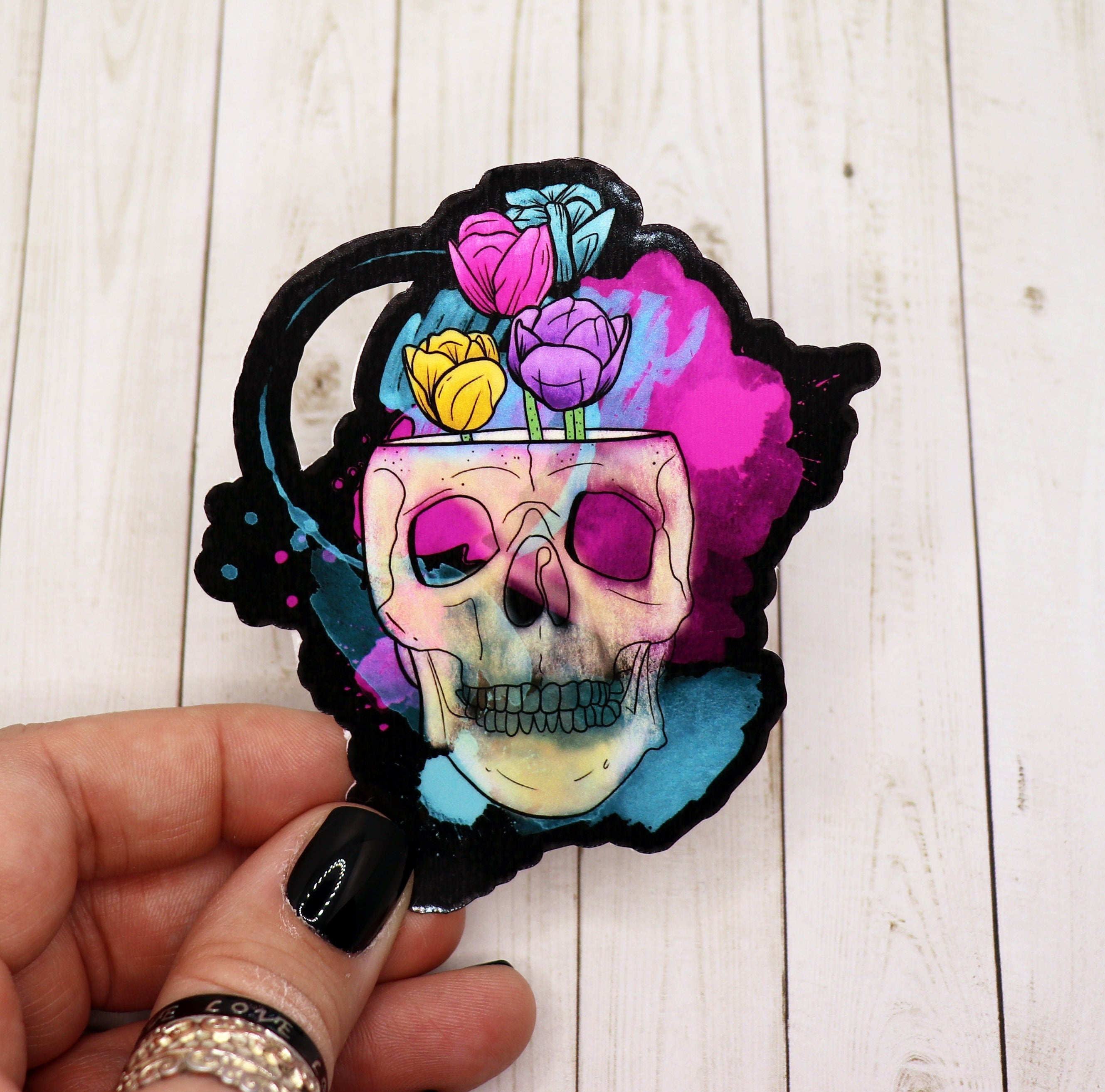 A vibrant Colorful Skull Sticker featuring a detailed skull design with bright colors on a matte finish.