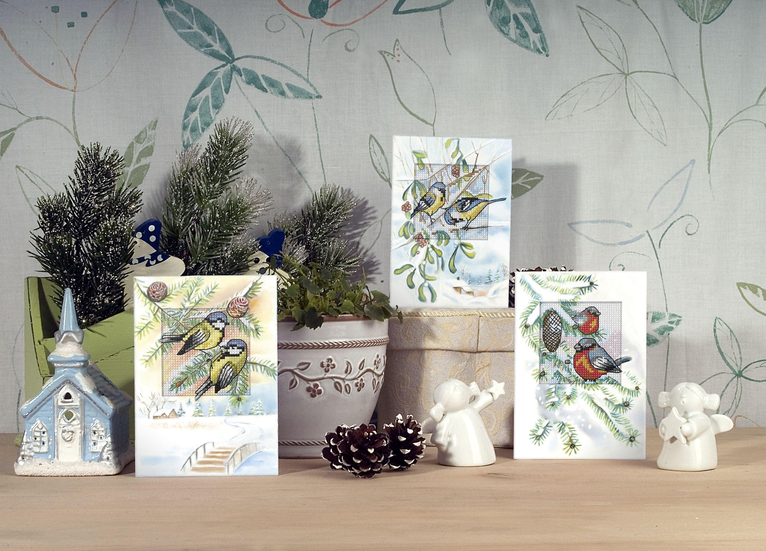 Complete counted cross stitch kit featuring Blue Titmice design, including fabric, threads, card, envelope, and needle.