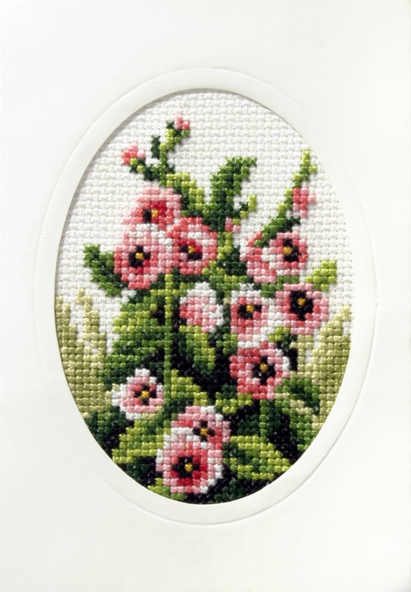 Complete cross stitch kit featuring Hollyhock design with materials including Zweigart aida fabric, DMC cotton, blank card, and needle.