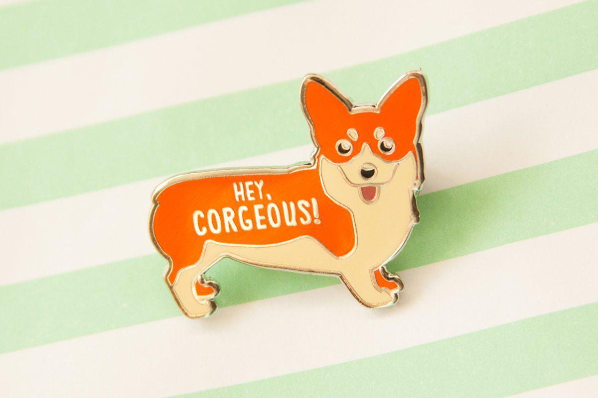 Corgi Hard Enamel Pin featuring a cute corgi design with the text 'Hey Corgeous!' on a silver metal background.