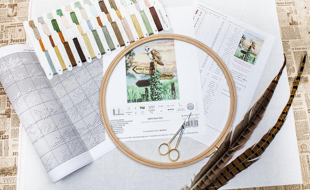 Counted Cross Stitch Kit featuring a barn owl design with vibrant threads and Aida canvas.