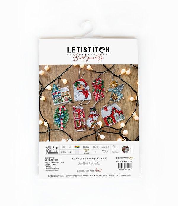 Counted Cross Stitch Kit Christmas Toys Kit 2 L8002 featuring colorful threads, Aida canvas, and needle for holiday crafting.