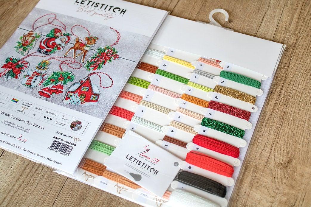 Counted Cross Stitch Kit Christmas toys kit nr.1 Leti966 featuring colorful threads, canvas, and accessories for holiday crafting.