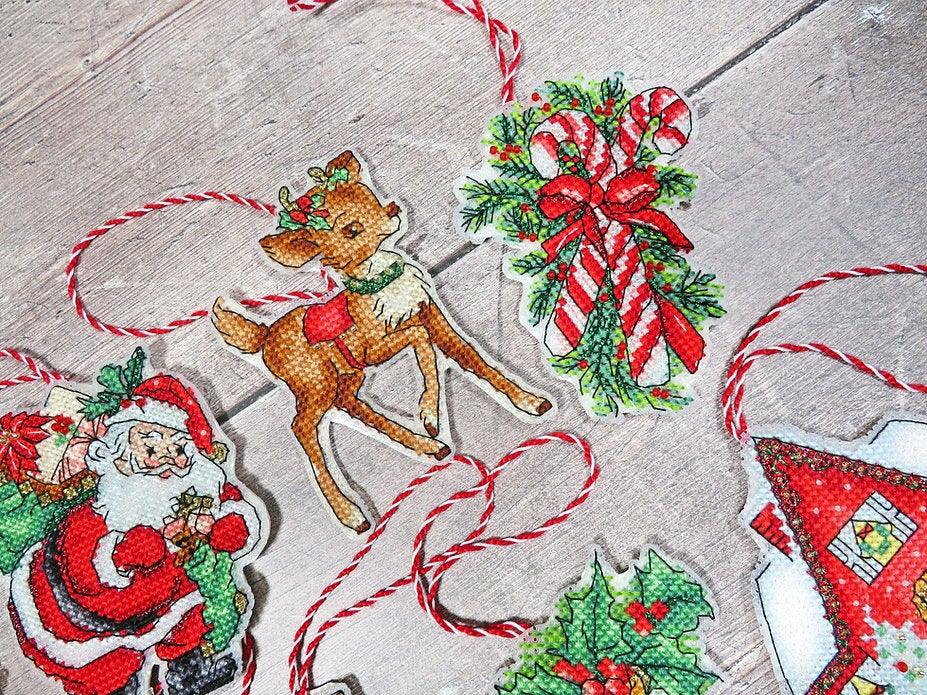 Counted Cross Stitch Kit Christmas toys kit nr.1 Leti966 featuring colorful threads, canvas, and accessories for holiday crafting.