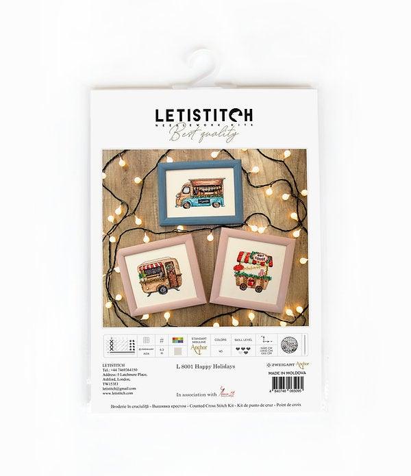 Counted Cross Stitch Kit Happy Holidays L8001 featuring colorful threads, canvas, and needle for festive stitching.