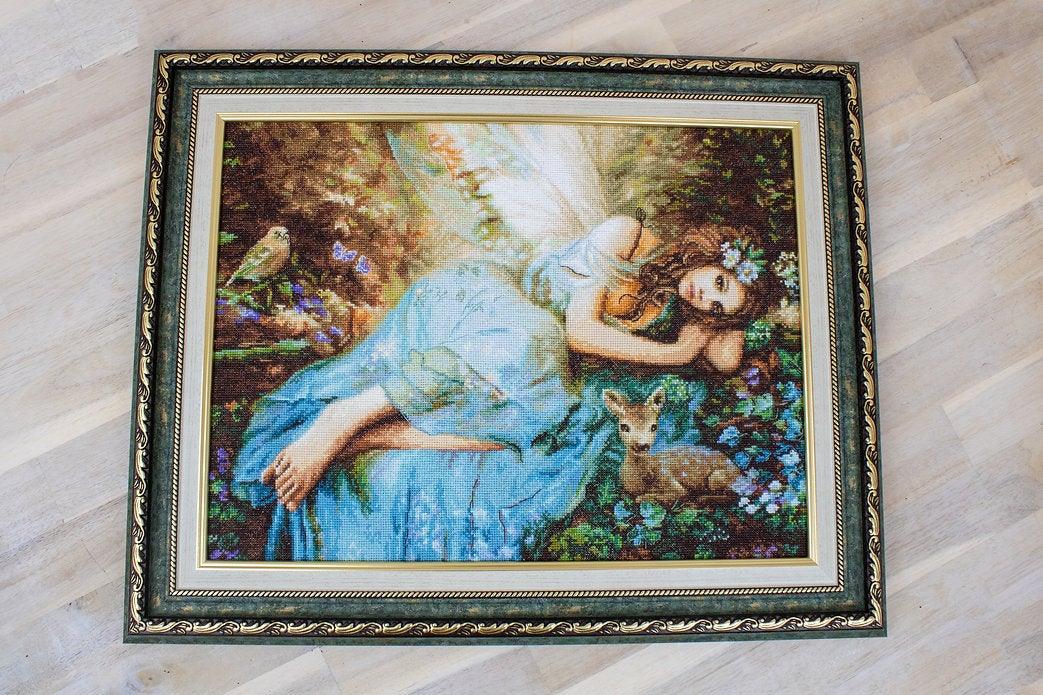 Counted Cross Stitch Kit Spring Fairy Leti960 featuring vibrant threads and canvas for crafting.